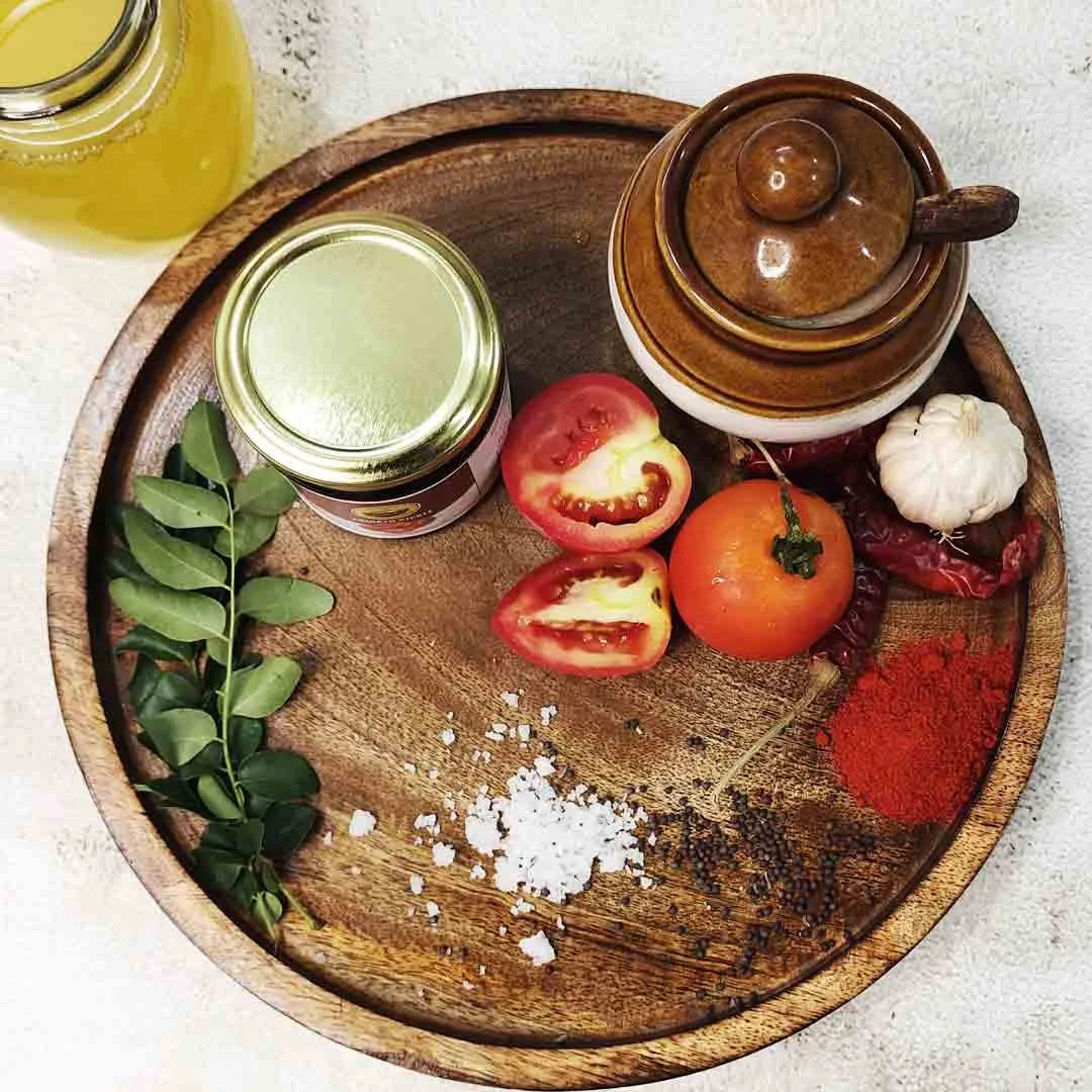 Homemade Tomato Pickle – A spicy and tangy South Indian pickle made with sun-ripened tomatoes, traditional spices, and pure edible oil. Perfect for rice, dosa, and roti.